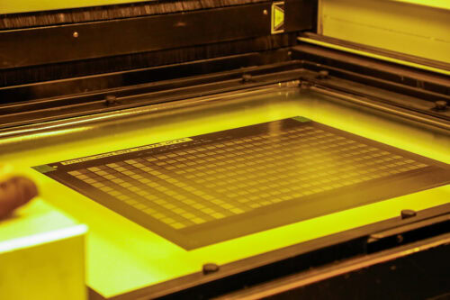 metal sheet being exposed to UV light before photochemical etching