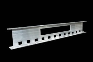 Long aluminum extrusion rail with a row of evenly spaced square holes along its base and a large rectangular cutout in the middle, on a black background.